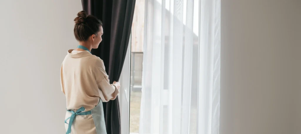 A happy customer after our professional curtain cleaning service.
